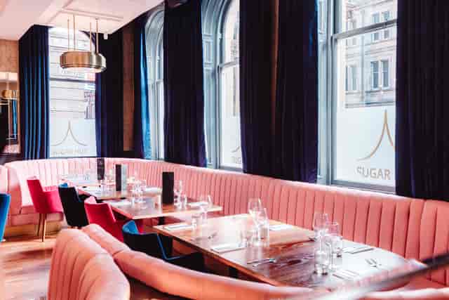 Stylish dining space in Sugar Hut Liverpool, perfect for intimate meetings and events.