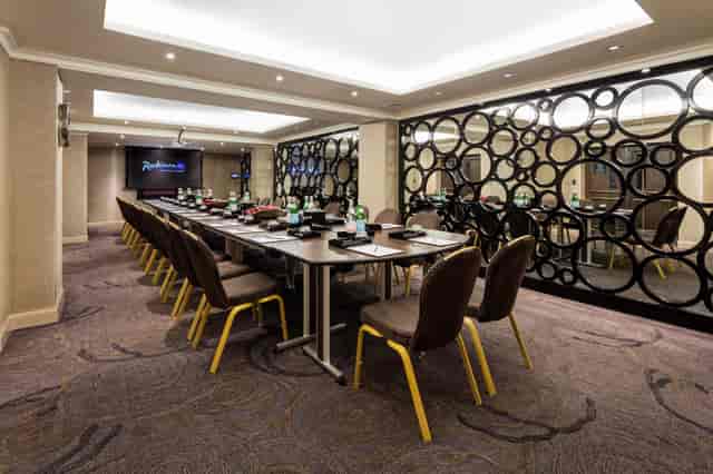 Cromwell Suite meeting room at Radisson Blu, modern decor, ideal for conferences and events.