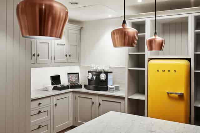 Stylish Meeting Centre kitchen in Marlin Waterloo with SMEG fridge, ideal for events.