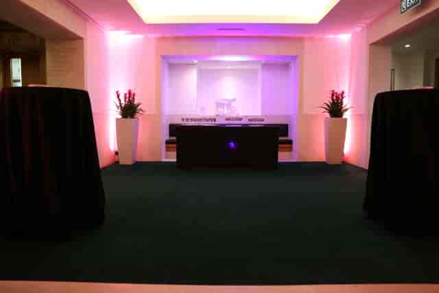 Boardroom Suite at British Library, modern event space with elegant purple lighting.