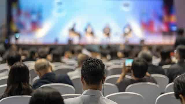 Port of Liverpool Suite conference with engaged audience at panel discussion.