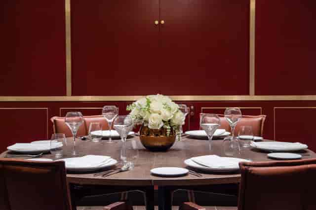 Elegant dining table with floral centerpiece at Vintry and Mercer Hotel event space.