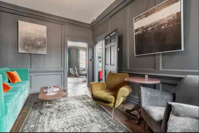 Stylish meeting space in Blacks with cozy decor for gatherings and brainstorming sessions.
