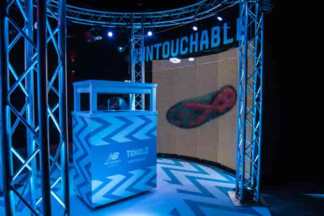 Eclipse Theatre: vibrant event space with multimedia backdrop for product launches.