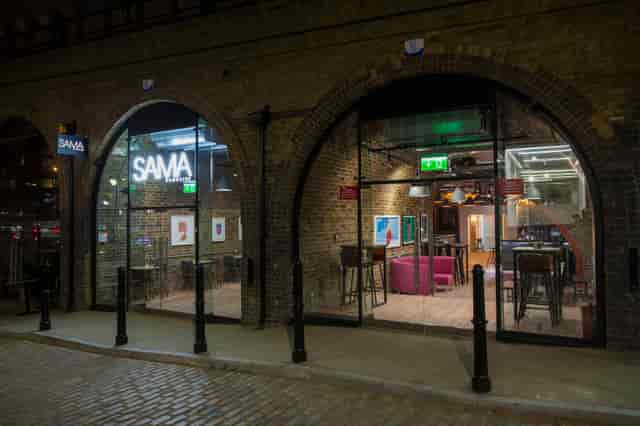 Upper Arch venue with large glass windows, ideal for corporate events and social gatherings.