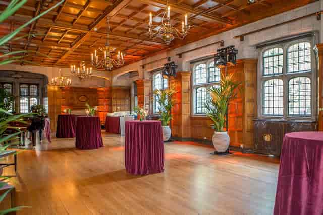 Great Hall at Two Temple Place: elegant wooden paneling, ideal for upscale events and receptions.