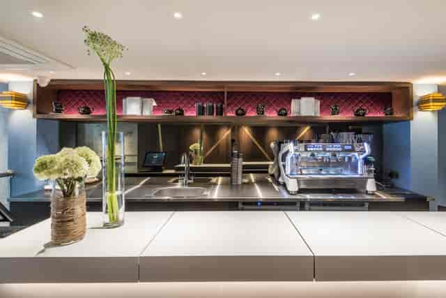 Modern coffee station at SALON64, perfect for networking events and meetings.