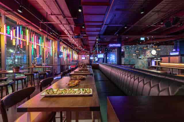 Vibrant event space at Puttshack White City with modern decor for social gatherings.
