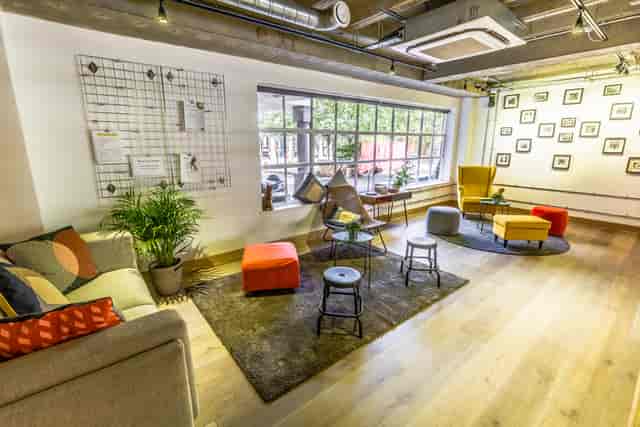 Modern meeting space with colorful seating for creative brainstorming sessions.