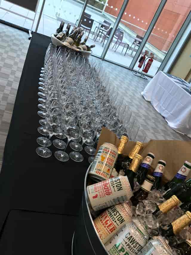 Elegant sparkling wine glasses in Queen Edith's for a sophisticated event.
