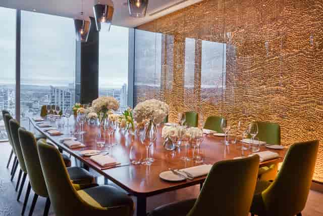 Private dining room with elegant table and views, perfect for corporate meetings and events.