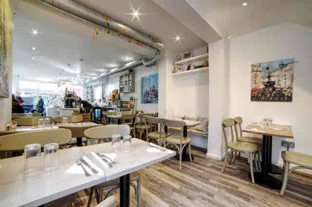 Cozy Chelsea Creperie venue with modern decor for informal meetings and small events.