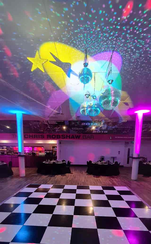 Chris Robshaw Bar at Twickenham Stoop Stadium, vibrant party venue with disco balls.