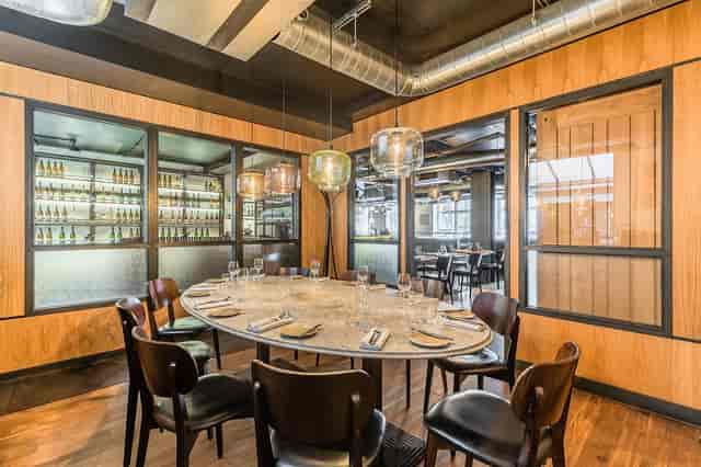 Private dining room with round table at Heddon Street Kitchen for exclusive events.