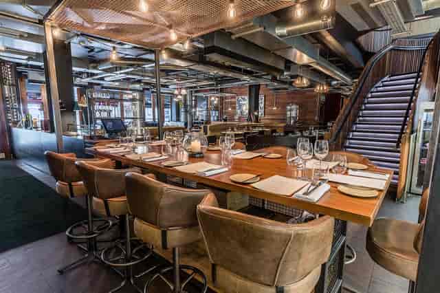 Stylish kitchen table setting in Heddon Street Kitchen for intimate events and meetings.