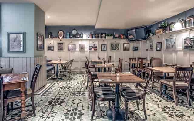 Cozy dining area in Snug, Paternoster, perfect for intimate gatherings and events.