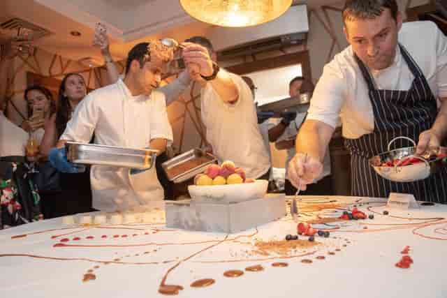 Engaging culinary presentation at The Cutting Room, ideal for live cooking events.