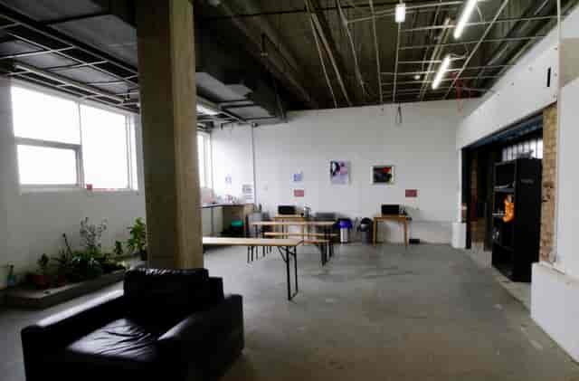 Atrium in Many Hands: versatile event space with natural light for creative workshops.