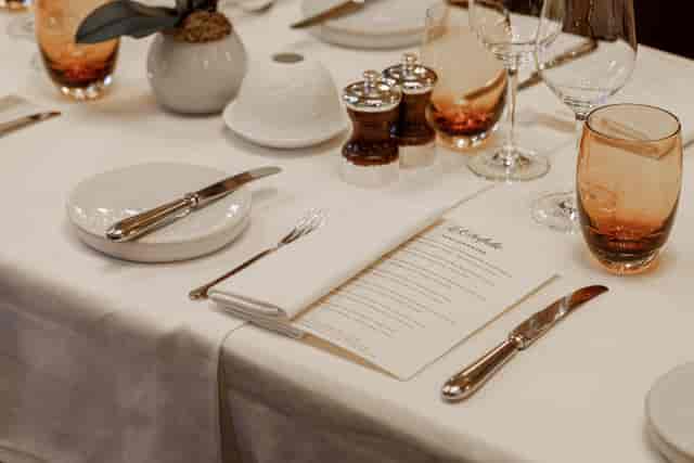 Elegant dining table setup at Galvin La Chapelle for upscale events and meetings.