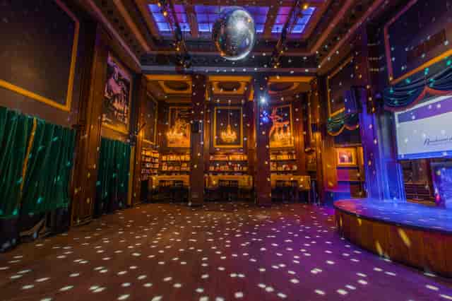 Vibrant event space with disco ball at Revolucion De Cuba Birmingham for parties and corporate events.