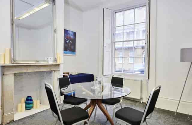 Richard Gladstone Room at Oxford Playhouse, round glass table, ideal for meetings and brainstorming.