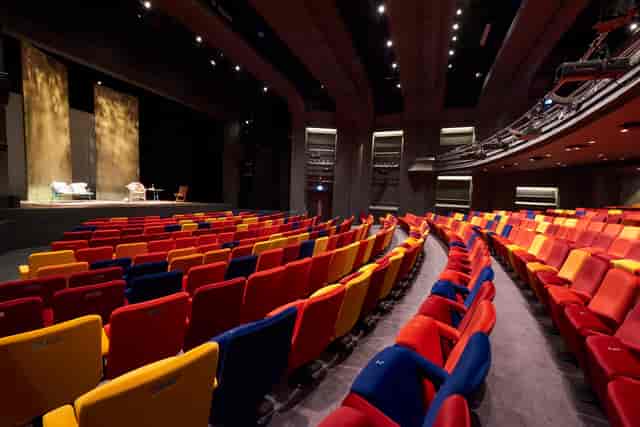 Main Stage Auditorium at Oxford Playhouse with vibrant tiered seating for events.