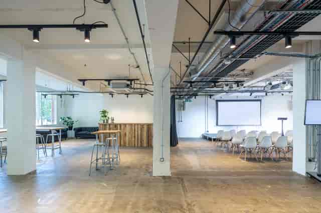 Industrial-chic venue, The White Space at The Ministry with theater seating for corporate conferences.
