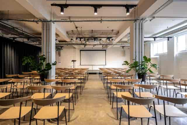 Industrial-chic event space at The Ministry for corporate conferences and plenary sessions.