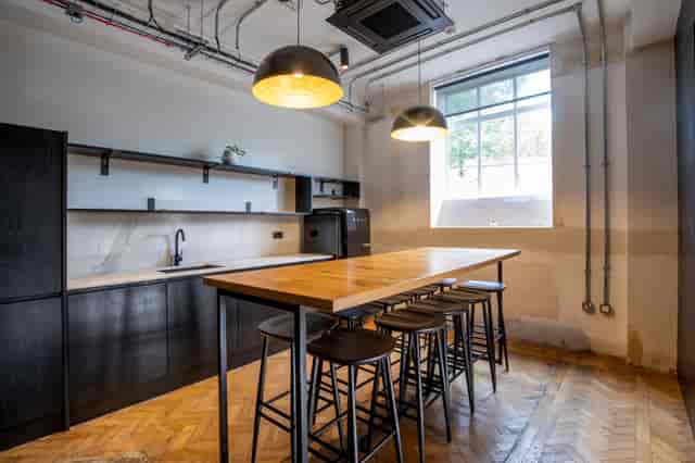 Meeting Room Suite at The Ministry with industrial-chic decor for team brainstorming workshops.