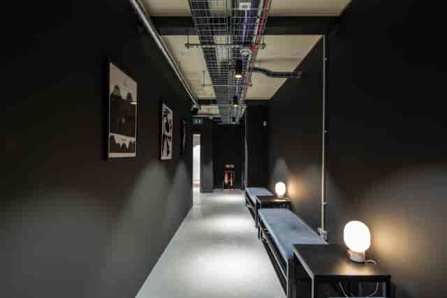 Industrial-chic transit area at The Studio, The Ministry for event space or meeting room hire.