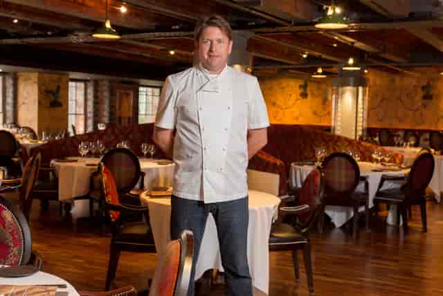 Professional chef at James Martin restaurant, Manchester - ideal for upscale events and dining.