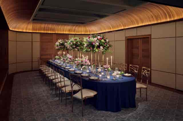 Elegant banquet table with floral centerpieces in Wilton Room, perfect for weddings and corporate events.