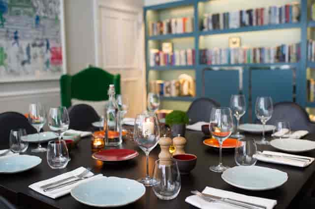 Elegant dining table setup in The Library, Ampersand Hotel for intimate gatherings.
