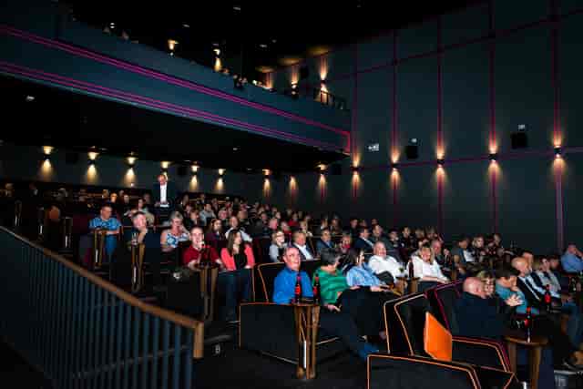 Packed cinema audience in tiered seating at Everyman Leeds for an engaging event.