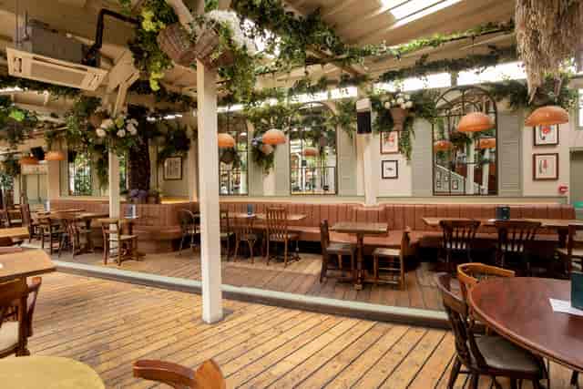 Versatile event space with greenery, ideal for gatherings and meetings at The Prince.