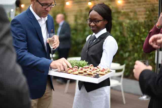 Sophisticated networking event on Roof Terrace with stylish hors d'oeuvres and attentive service.