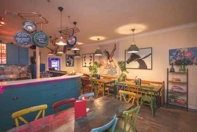 Vibrant event space with colorful decor for intimate gatherings and creative meetings.