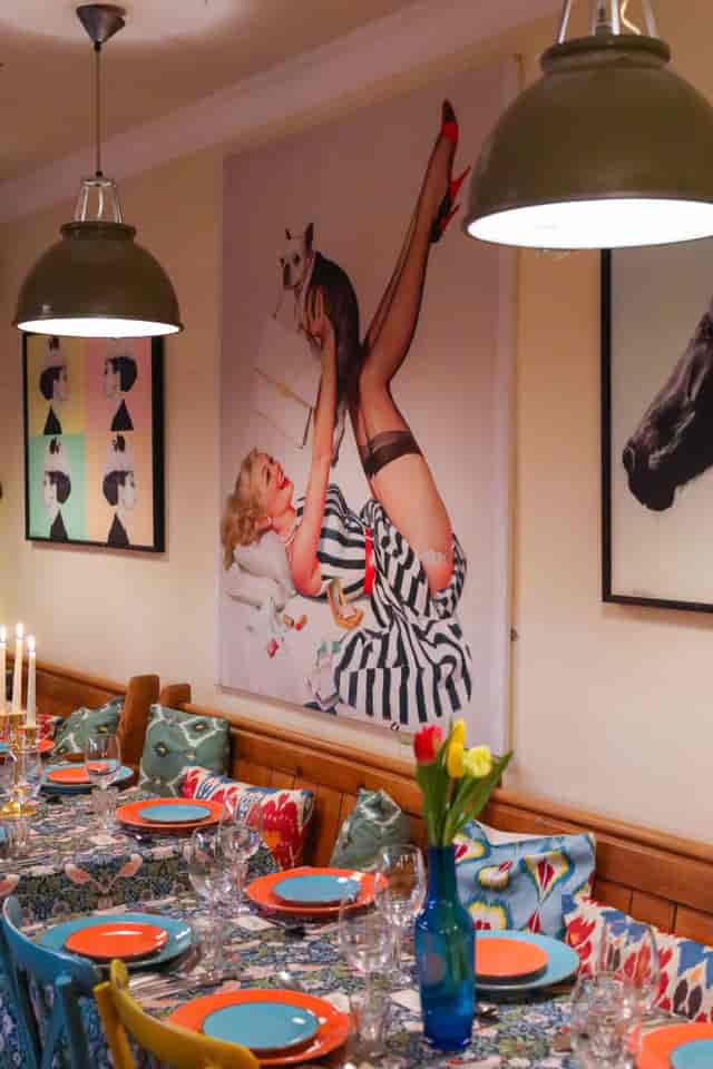 Vibrant event space with bold artwork, ideal for creative gatherings and themed events.