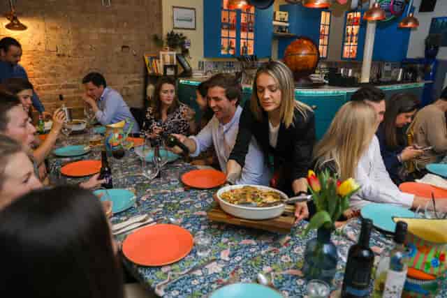 Vibrant dining setup in The Kitchen, ideal for networking and team-building events.
