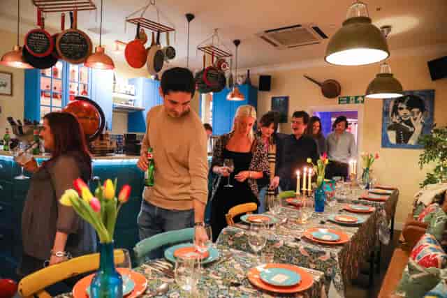 Vibrant dining setup at The Little Blue Door, perfect for intimate gatherings and events.