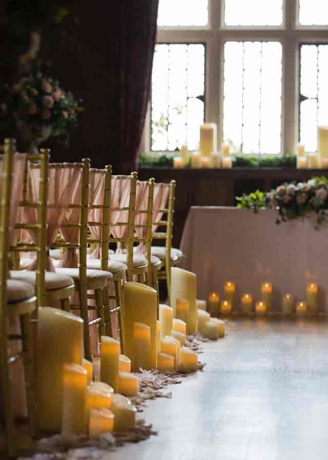 Elegant wedding setup at The Mansion House with gold chiavari chairs and floral decor.