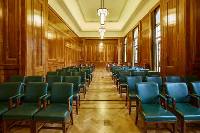 Hackney Town Hall Committee Room with green chairs, ideal for conferences and seminars.