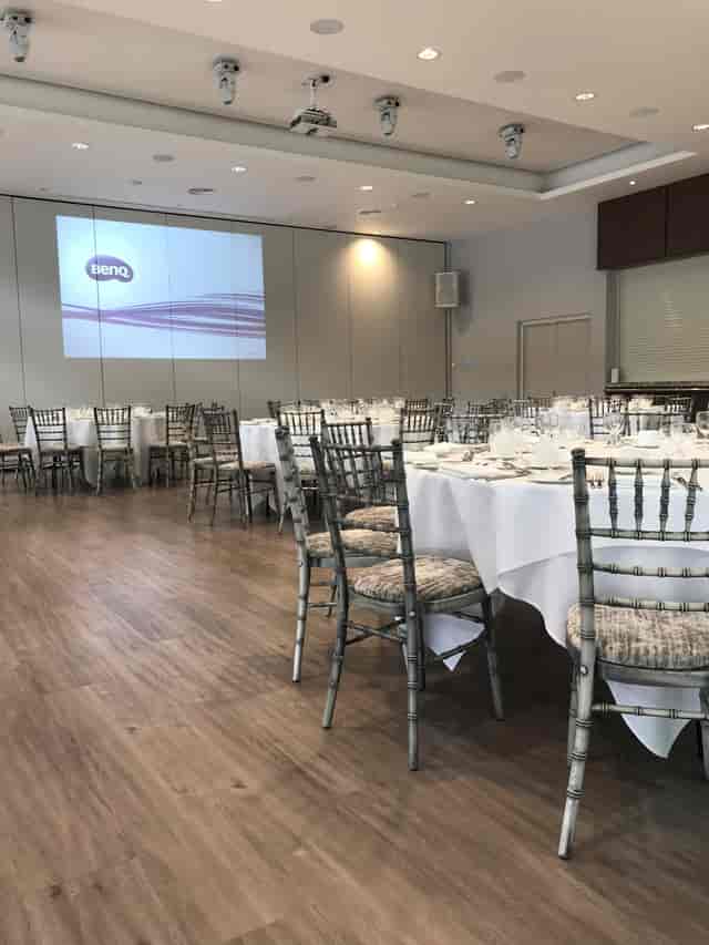 Garden Suite at Greenwoods Hotel, elegant round tables for formal events and presentations.