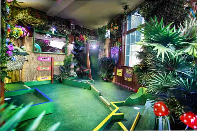 "Colorful mini-golf setup at The Arcade, ideal for team-building and networking events."