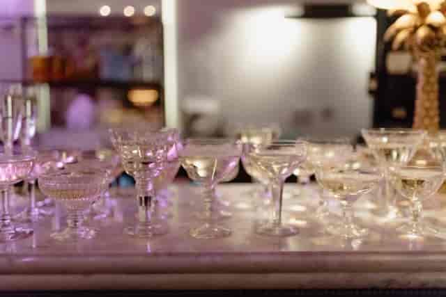 Elegant crystal glassware at The Castle Cinema bar for sophisticated events and celebrations.