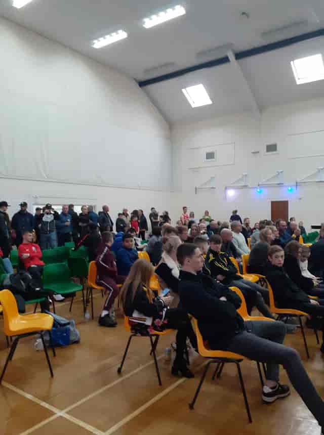 Diverse audience in Main Hall at Wickham Community Centre for a community event.