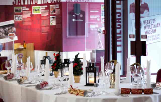 Elegant dining table setup at Heart of Midlothian Museum for corporate events and gatherings.
