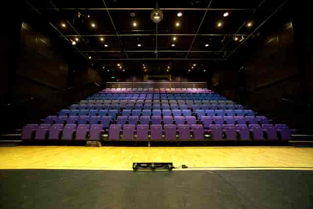Patrick Studio Birmingham Hippodrome auditorium with tiered purple seating for events and performances.