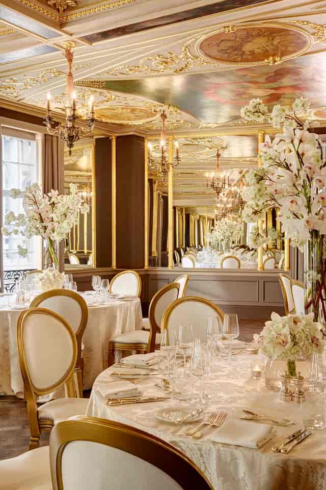Elegant Pompadour Ballroom with fine china, ideal for upscale events and formal dinners.