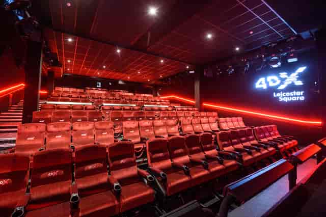 4DX cinema auditorium with plush red seating at Cineworld Leicester Square for events.